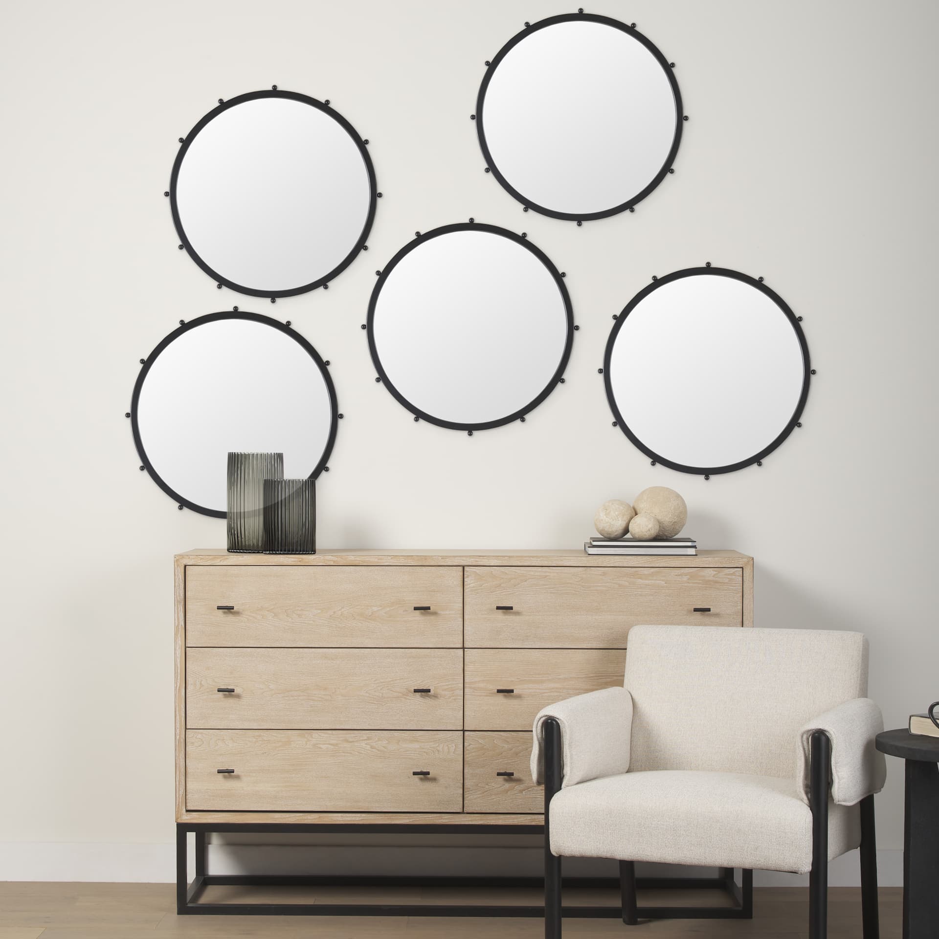 Elena I Small Black Wall Mirror — in a styled room