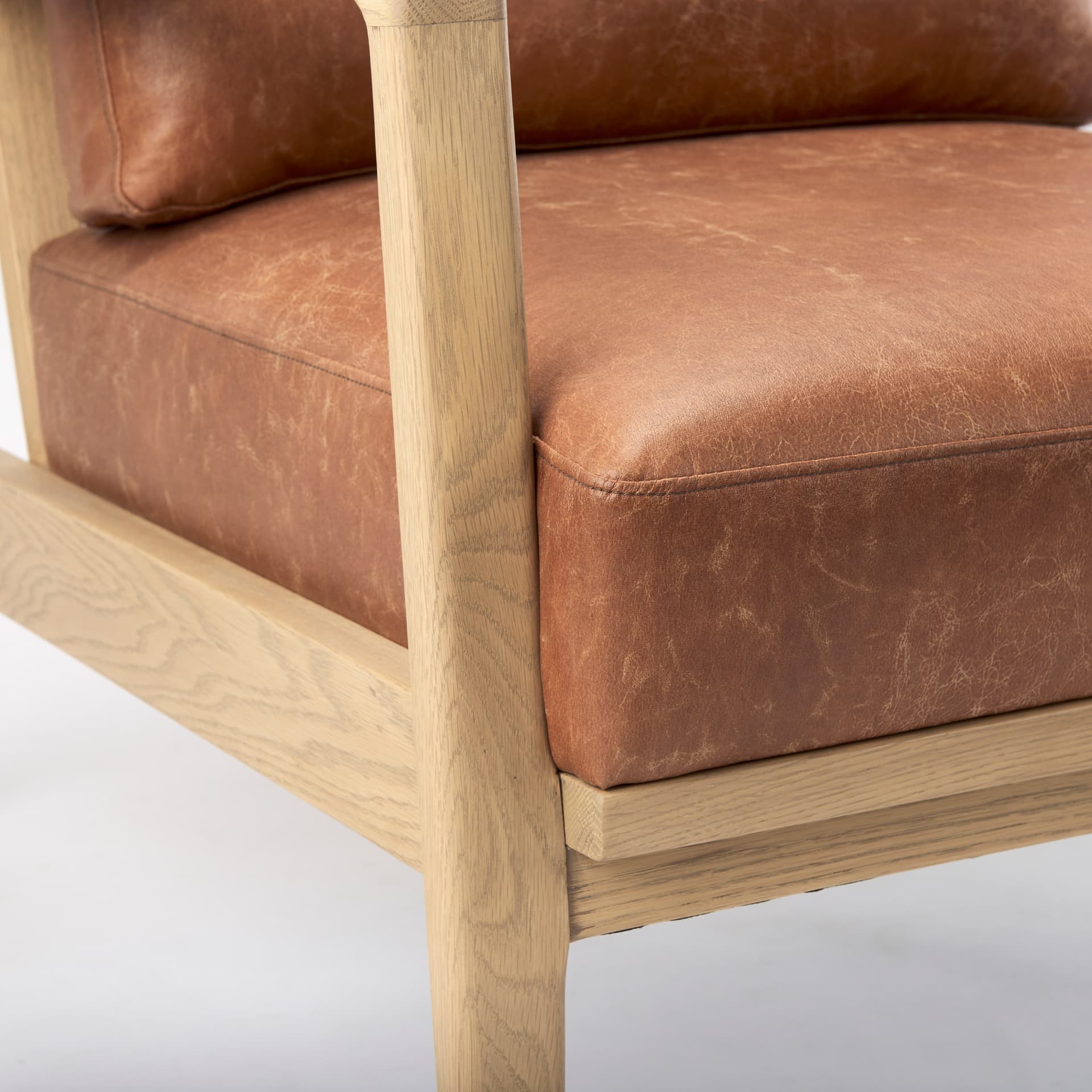 Raeleigh Tan Faux Leather Accent Chair — product photograph
