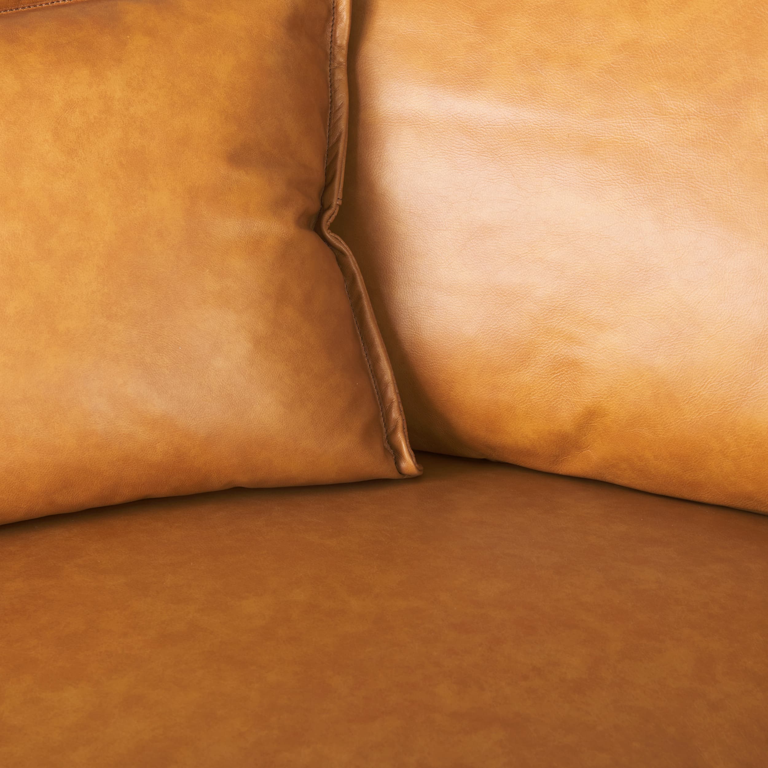D'Arcy 111"L x 70"D x 33"H Tan Leather Left Chaise Sectional — product photograph