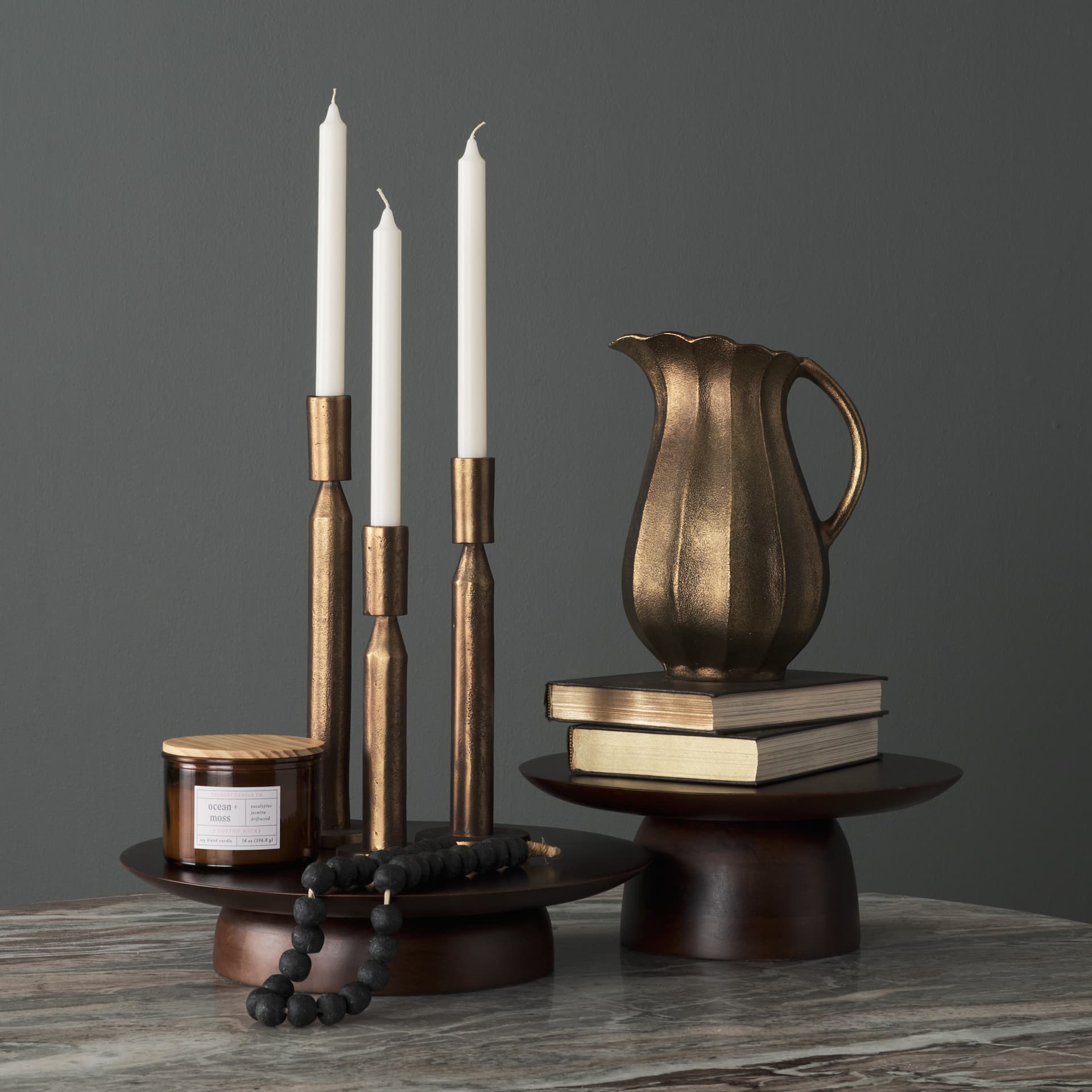 Sadira Small Mid-Dark Brown Solid Wood Round Riser — product photograph
