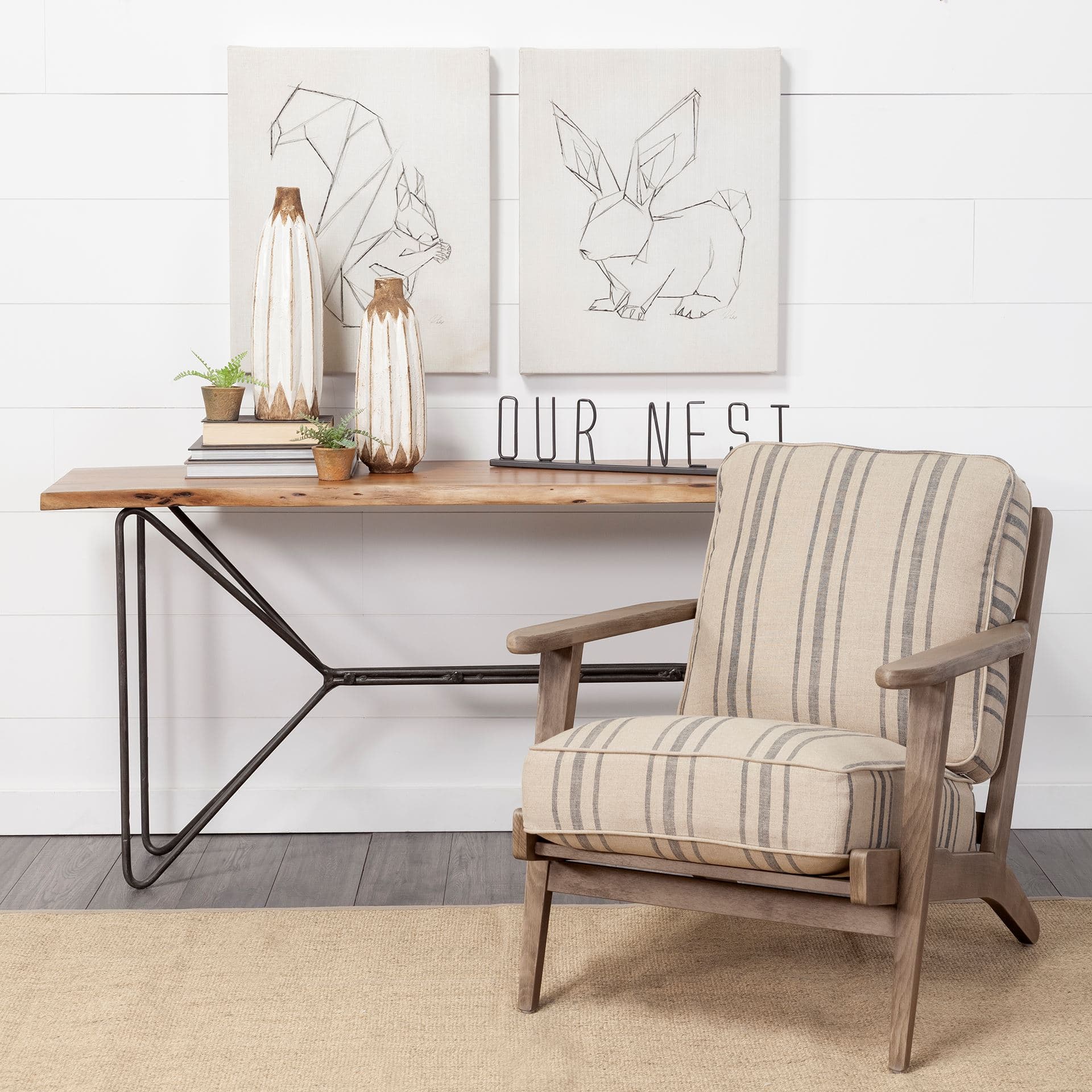 Our Nest 24L x 1W Black Metal Sign — in a styled room