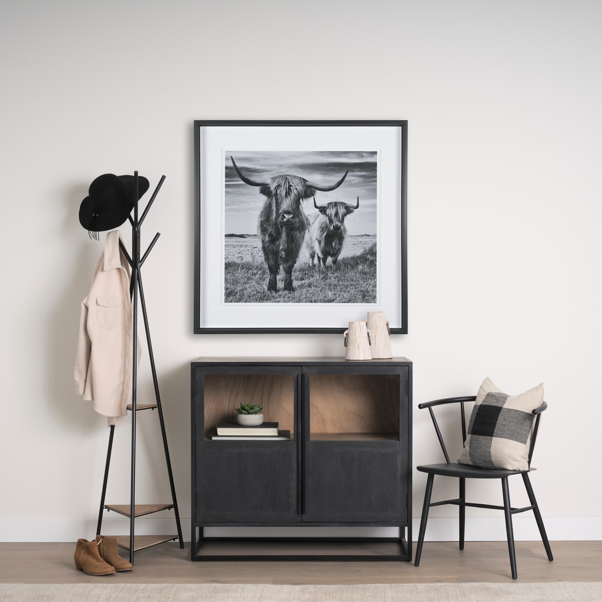Everett Matte Black Metal w/ Two Wood Shelves Coat Rack — in a styled room