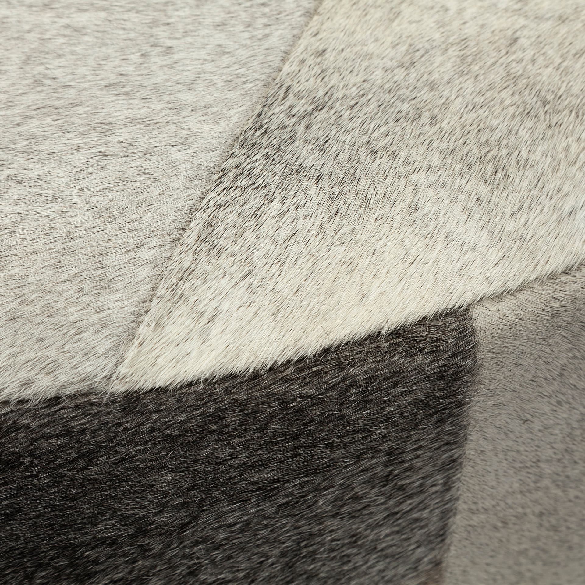 Zahavi 36" Gray Hair-On-hide W/Metal Base Ottoman — product photograph