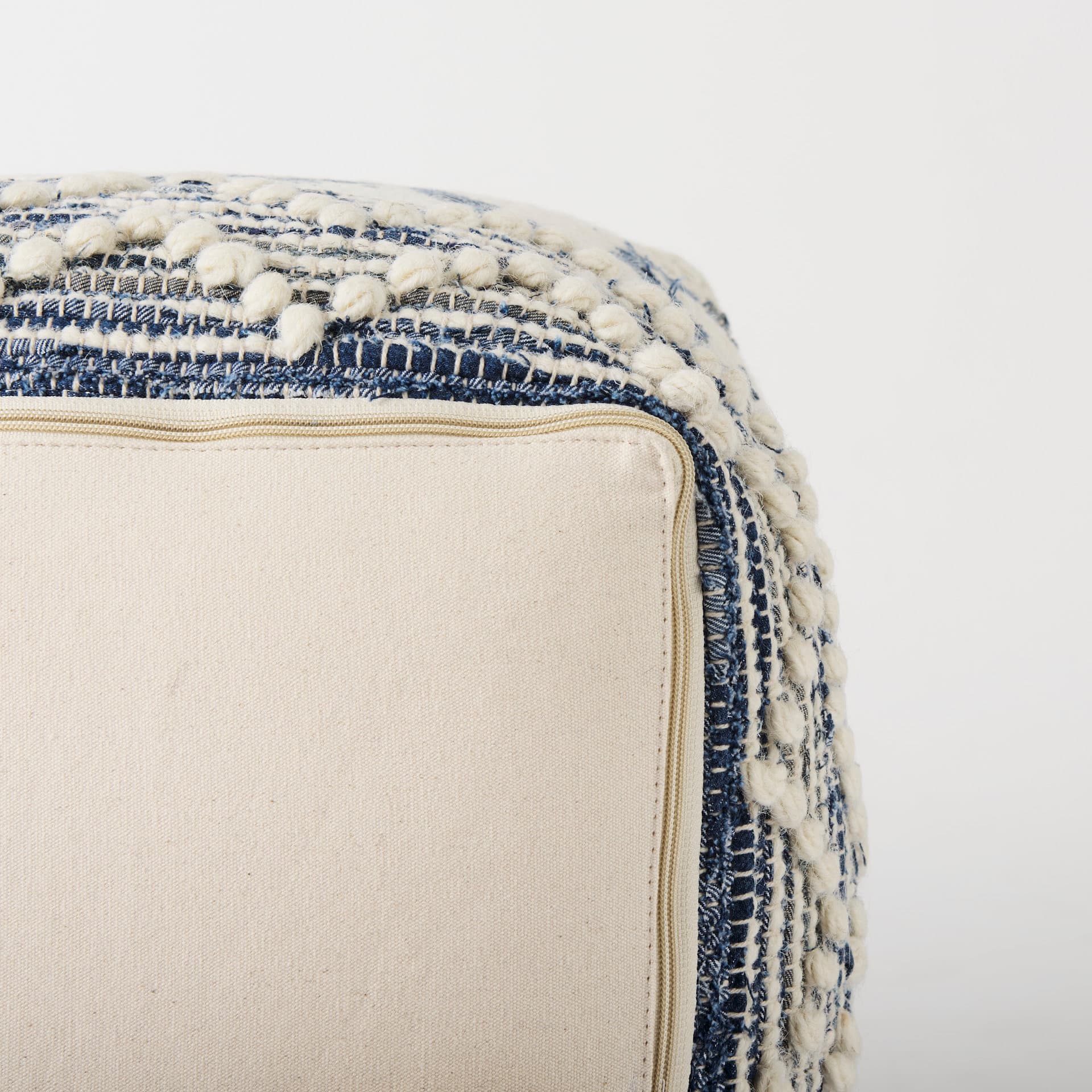Eshana 16.0L x 16.0W x 16.0H Cream Wool and Denim Patterned Pouf — product photograph