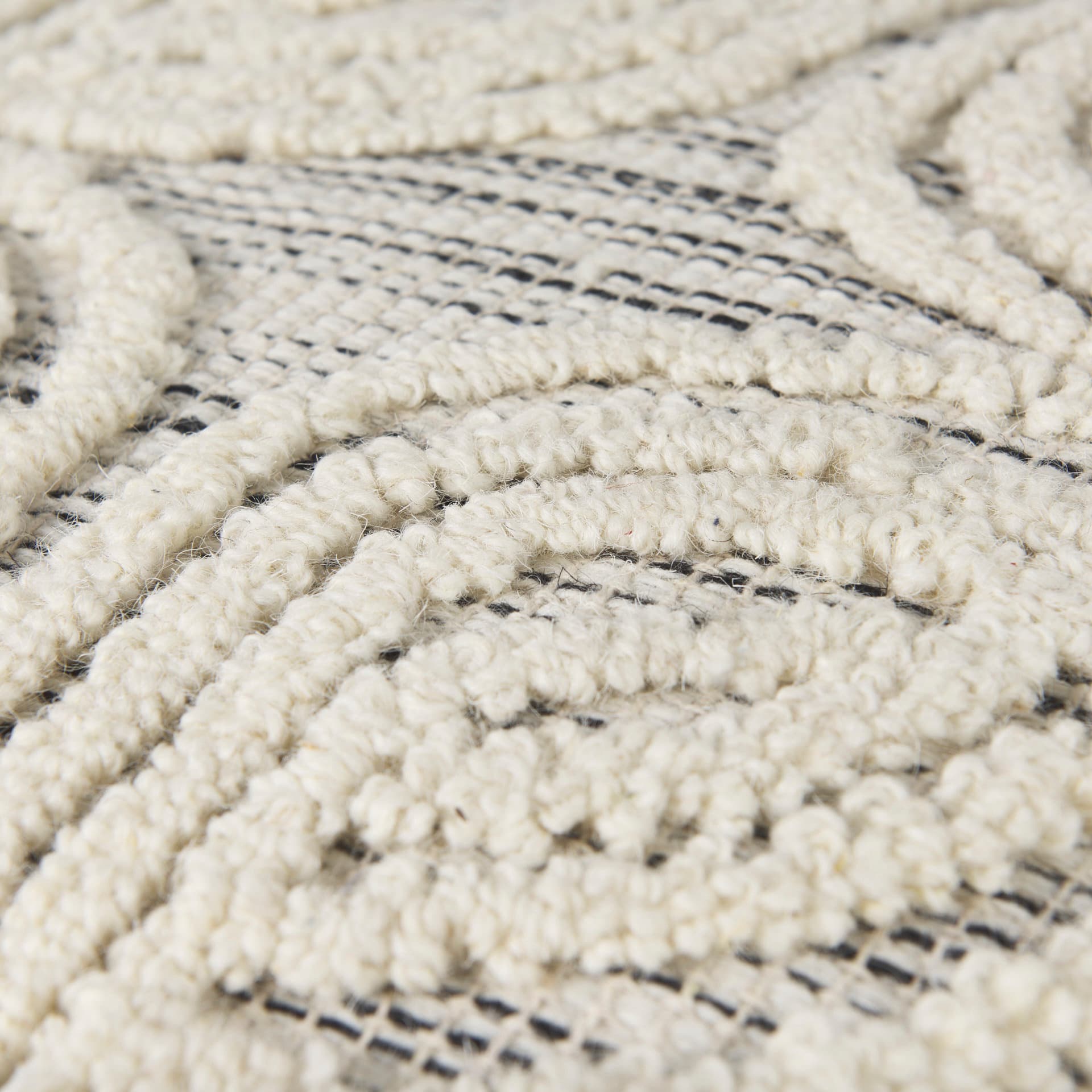 Amaya 16.0L x 16.0W x 16.0H Cream/Black/Gray Wool and Cotton Pouf — product photograph