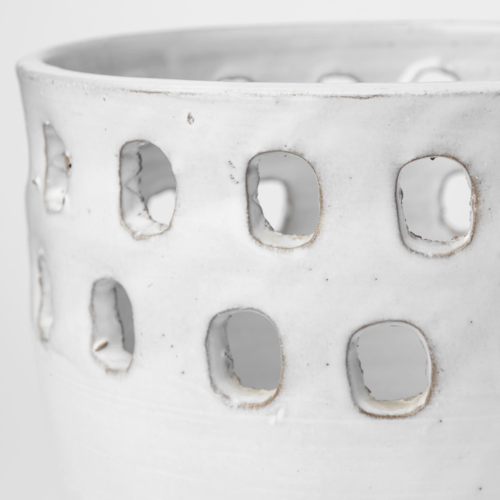 Larissa Set of Two White Ceramic Hollow Pattern Vases — product photograph