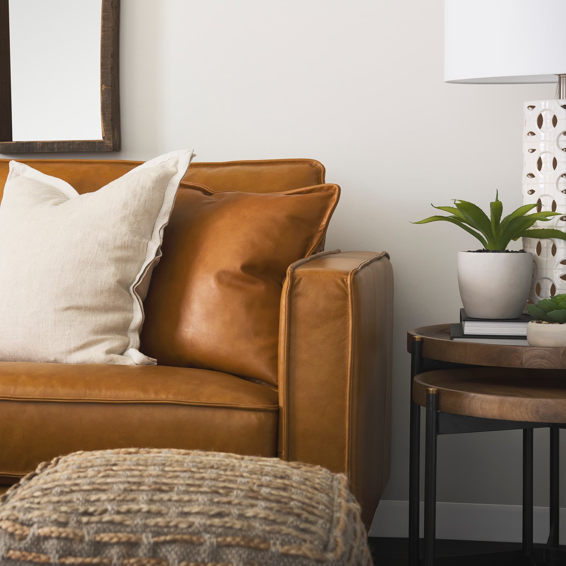D'Arcy 88.0L x 37.0W x 34.0H Tan Leather Sofa — in a styled room