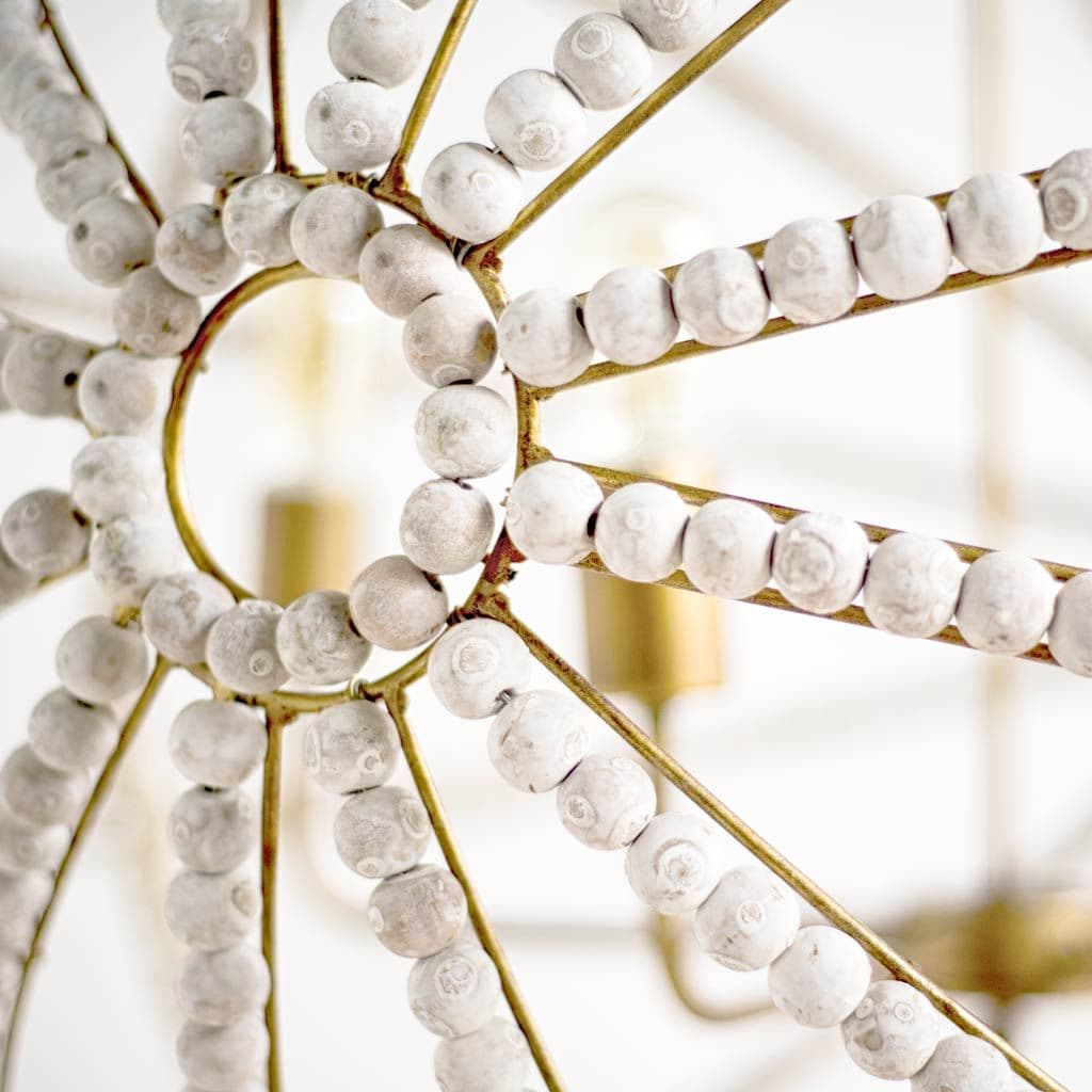 Ava White (34"D) Gold Metal and White Wood Beaded Six Bulb Chandelier — product photograph