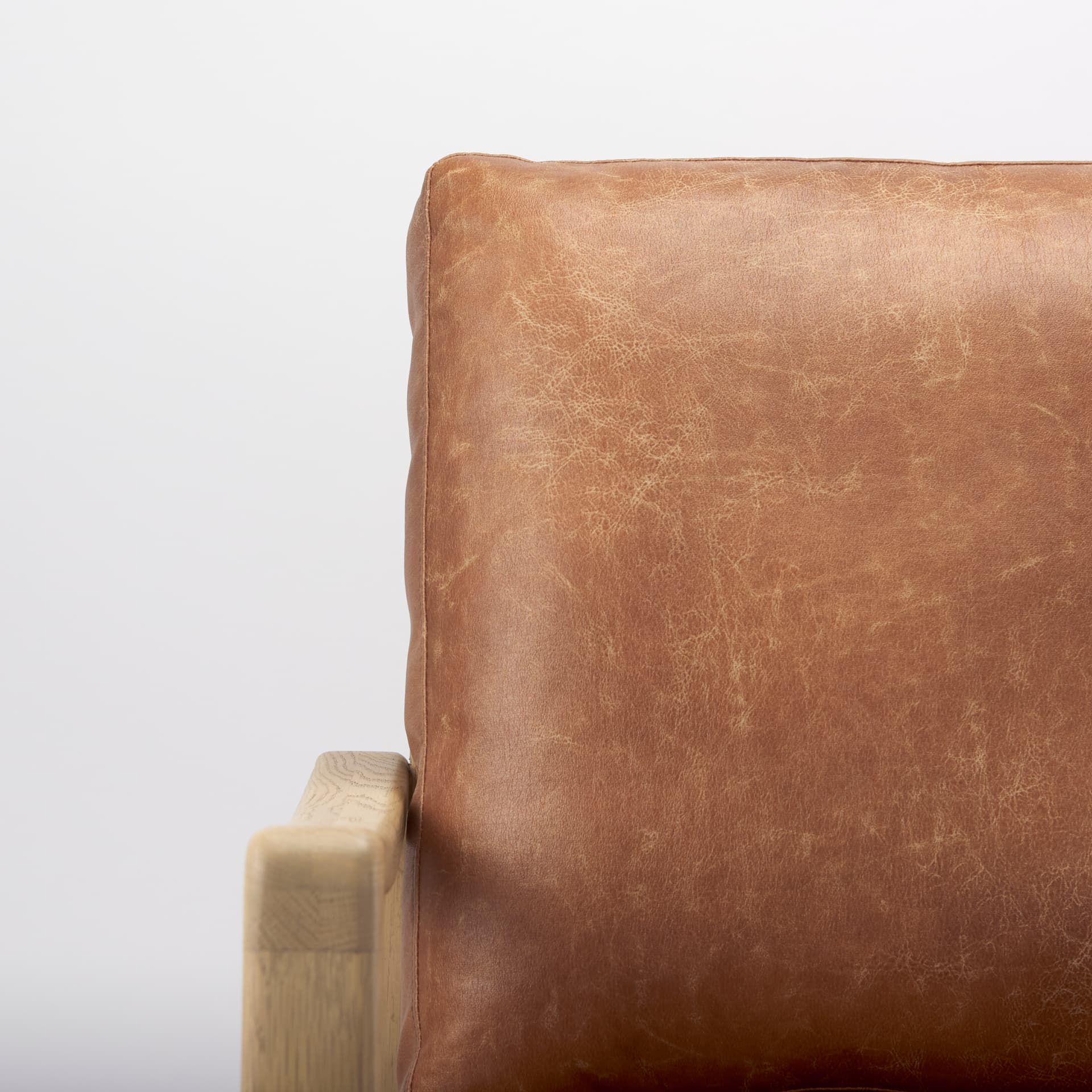 Raeleigh Tan Faux Leather Accent Chair — product photograph