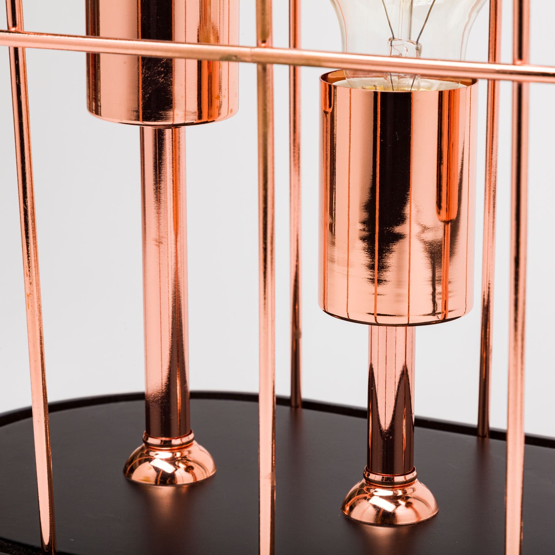 Sutton (19.3"H) Rose-Gold Metal Cylindrical Cage Three Bulb Table Lamp — product photograph