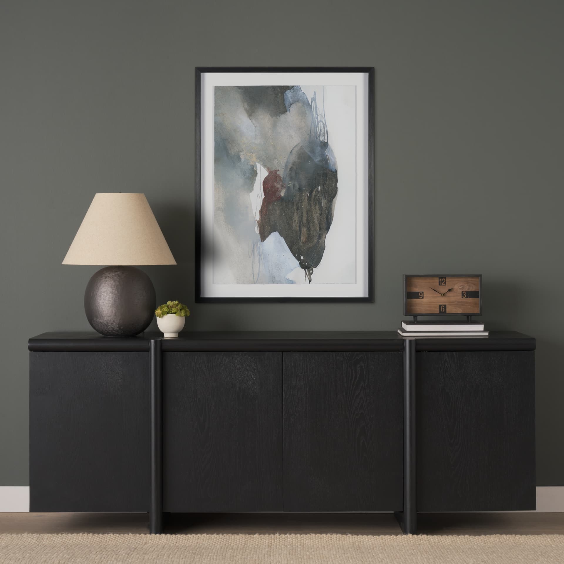 Rowan Black Oak Wood Closed 4 Door Sideboard — in a styled room