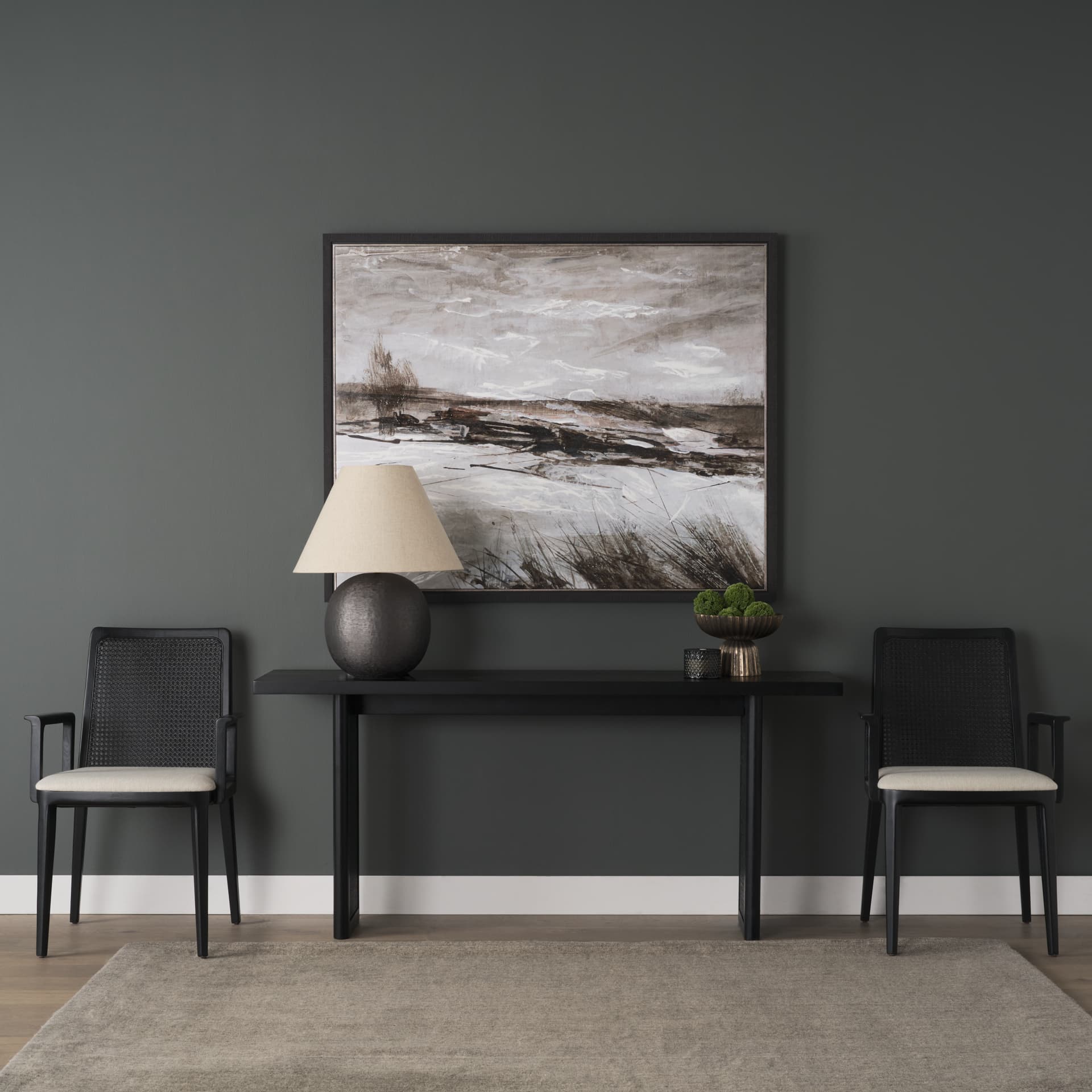 Grier 65" Black Wood w/ Black Cane Console Table — in a styled room