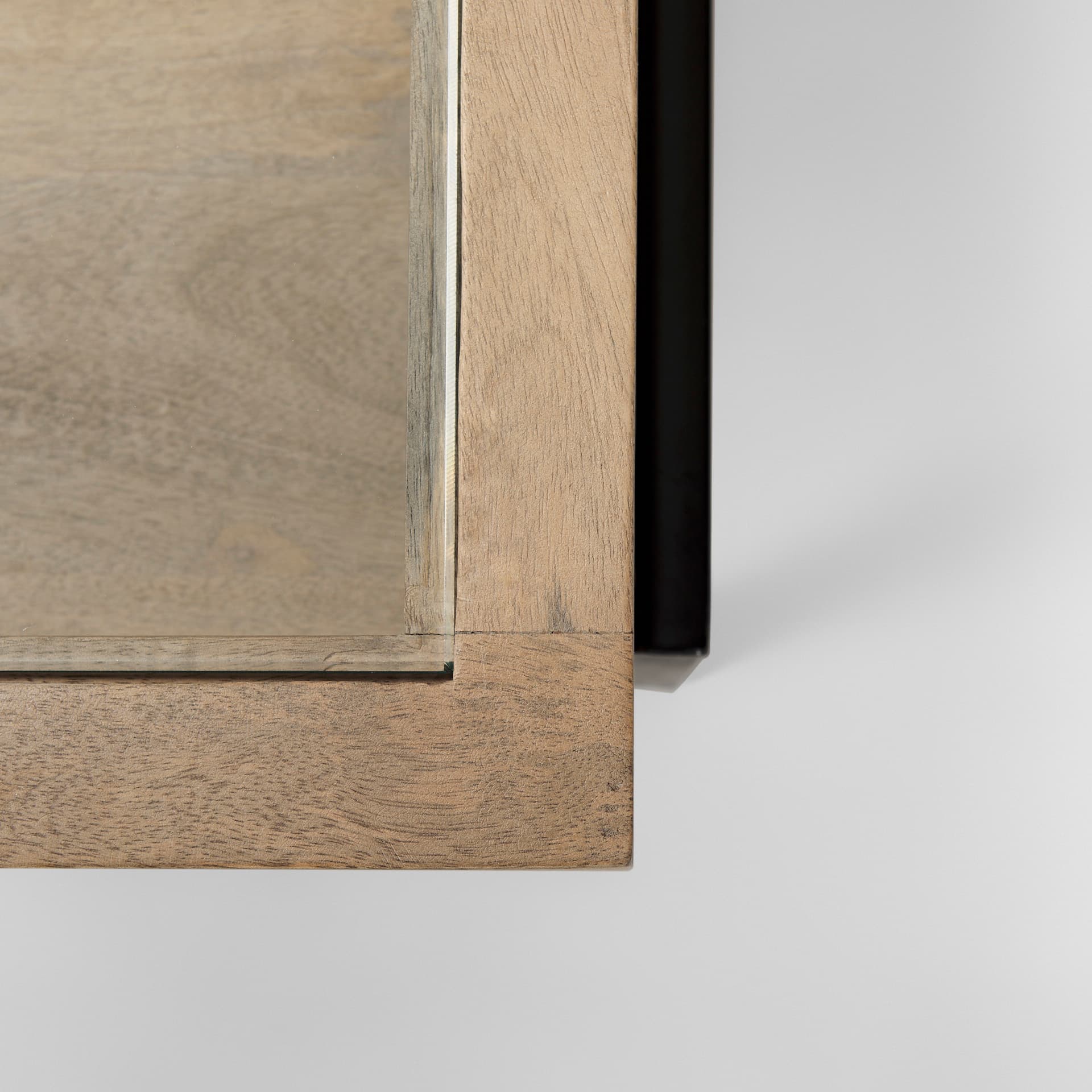 Arelius 49.5"L Rectangular Light Brown Wood w/ Black Metal Base Display Coffee Table — product photograph