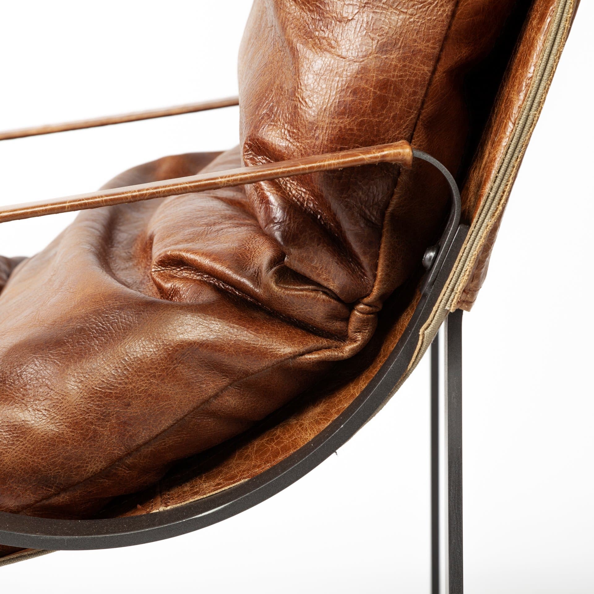 Hornet I 27.0L x 35.0W x 36.0H Brown Leather Unibody Seat w/ Black Metal Frame Accent Chair — product photograph