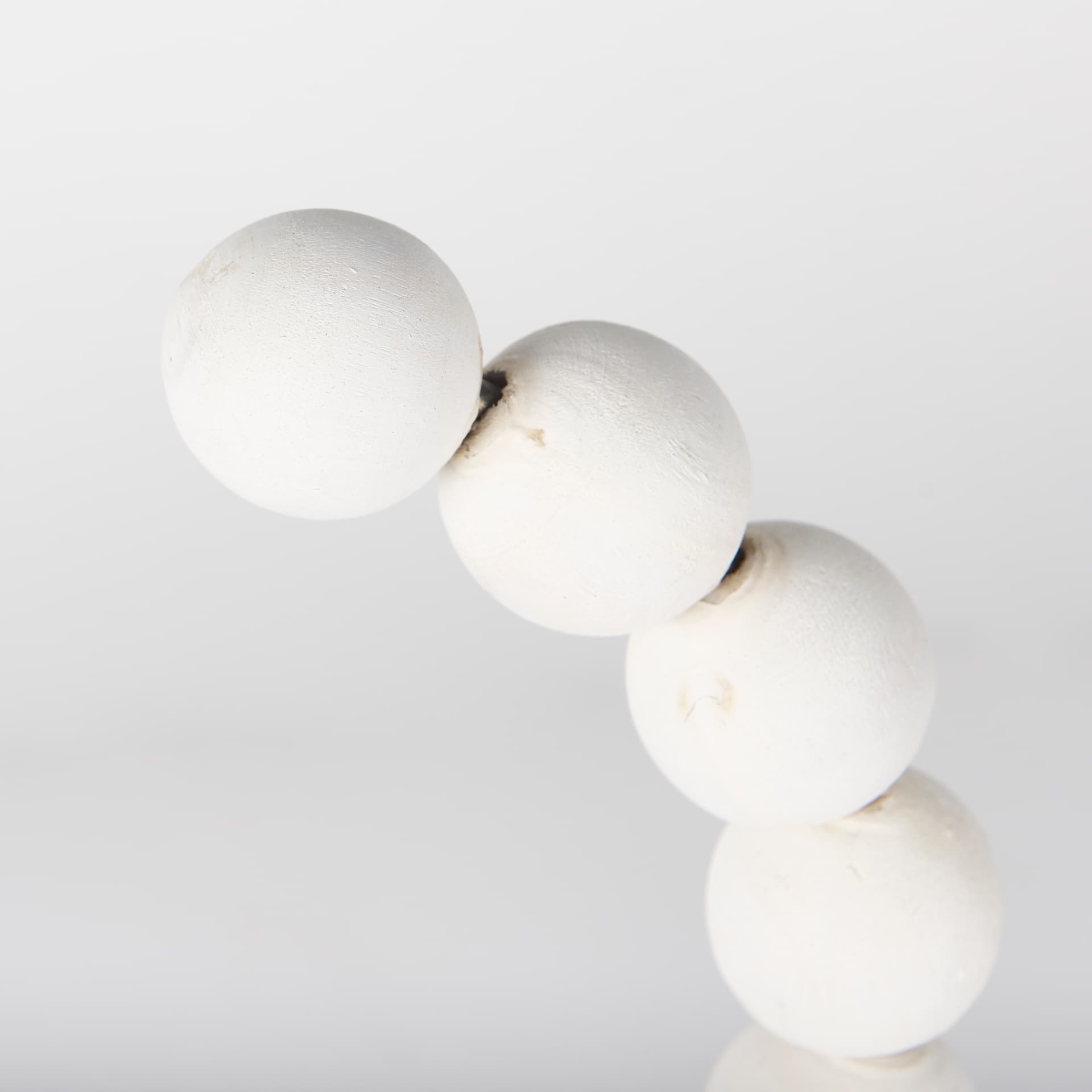 Pontchartrain I (Small) 9L x 5W White Beaded Broken Sphere Decorative Object W/ Gold Base — product photograph