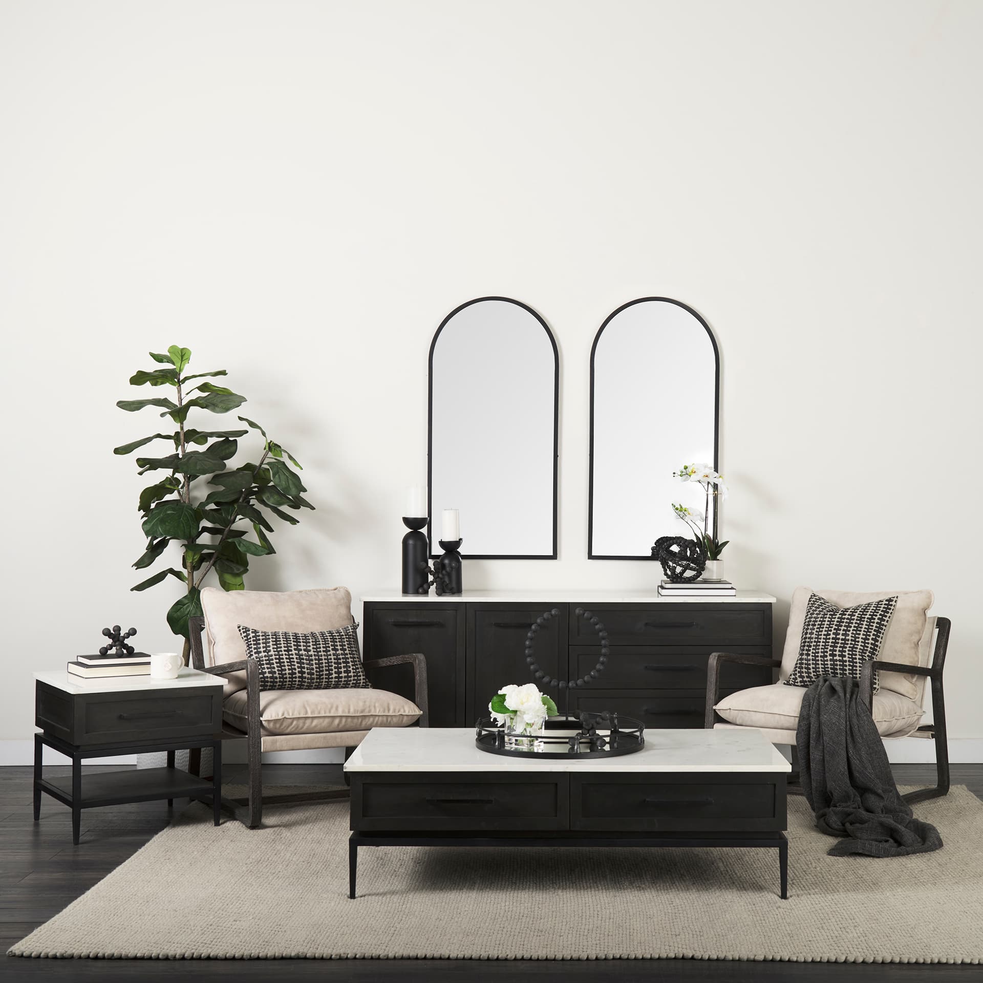 Kimbel 24L x 24W Black Metal Mirrored Base Round Tray — in a styled room