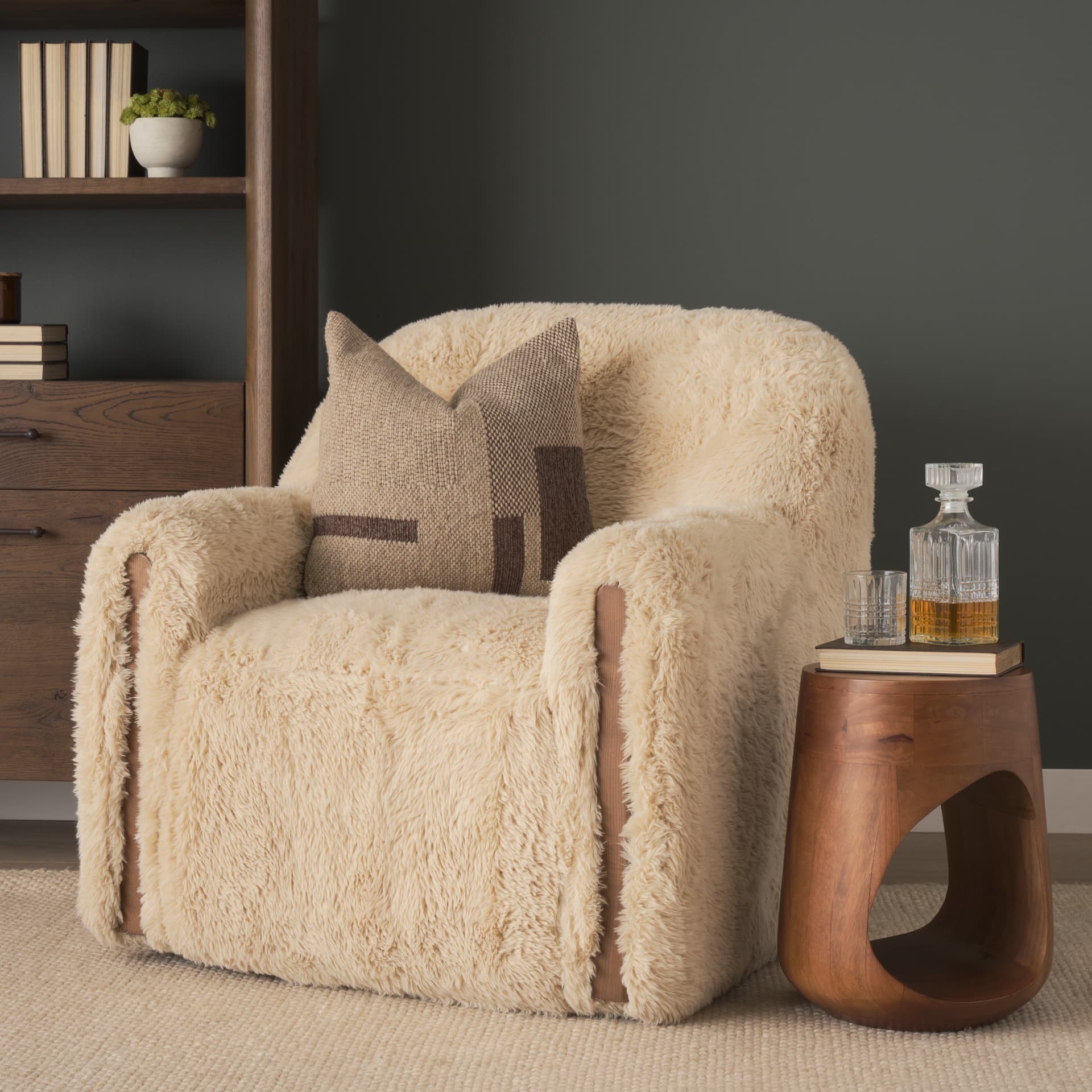 Huntley Cream Faux Fur Fabric Swivel Accent Chair — in a styled room