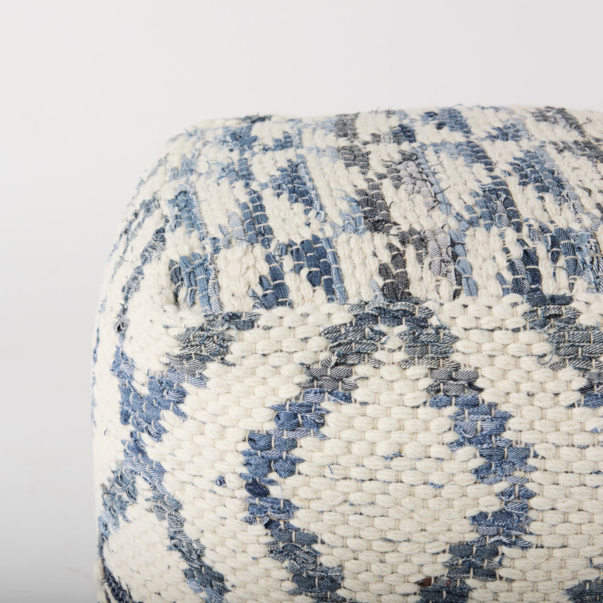 Eshana 16.0L x 16.0W x 16.0H Cream Wool and Denim Patterned Pouf — product photograph