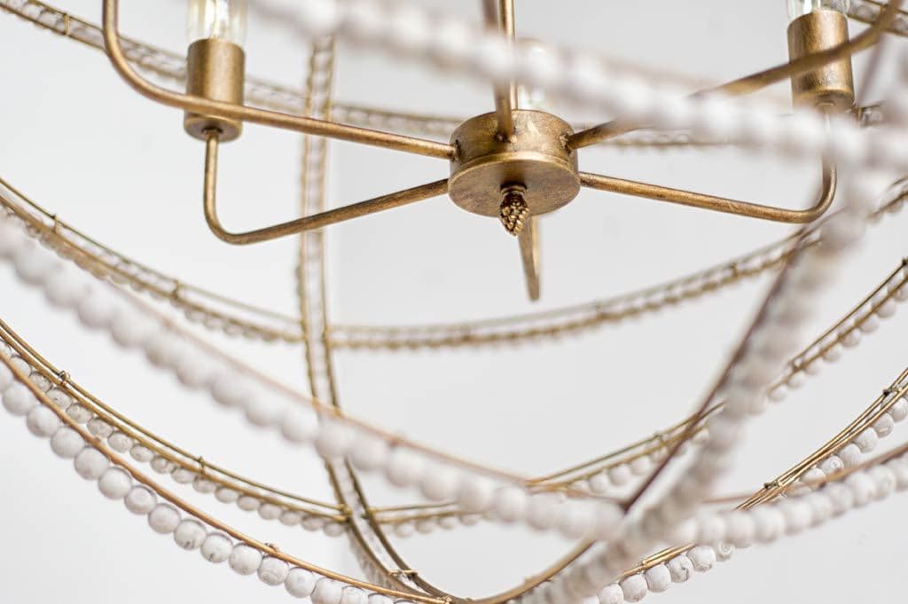 Ava White (34"D) Gold Metal and White Wood Beaded Six Bulb Chandelier — product photograph