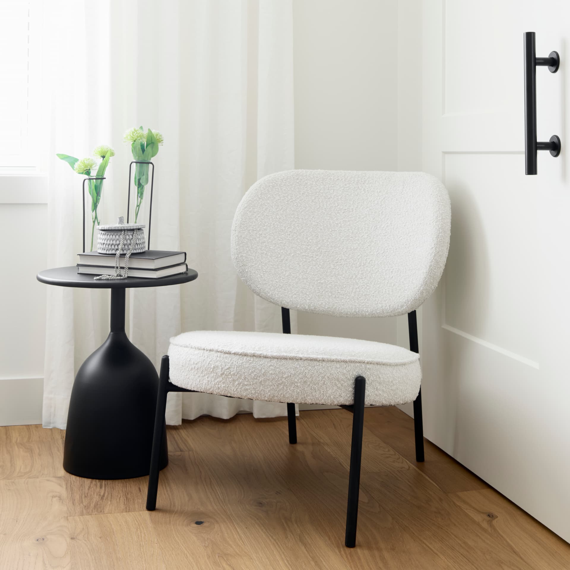 Amelia Cream Boucle W/Black Metal Upholstered Accent Chair 21.3L x 21.3W x 30.3H — in a styled room