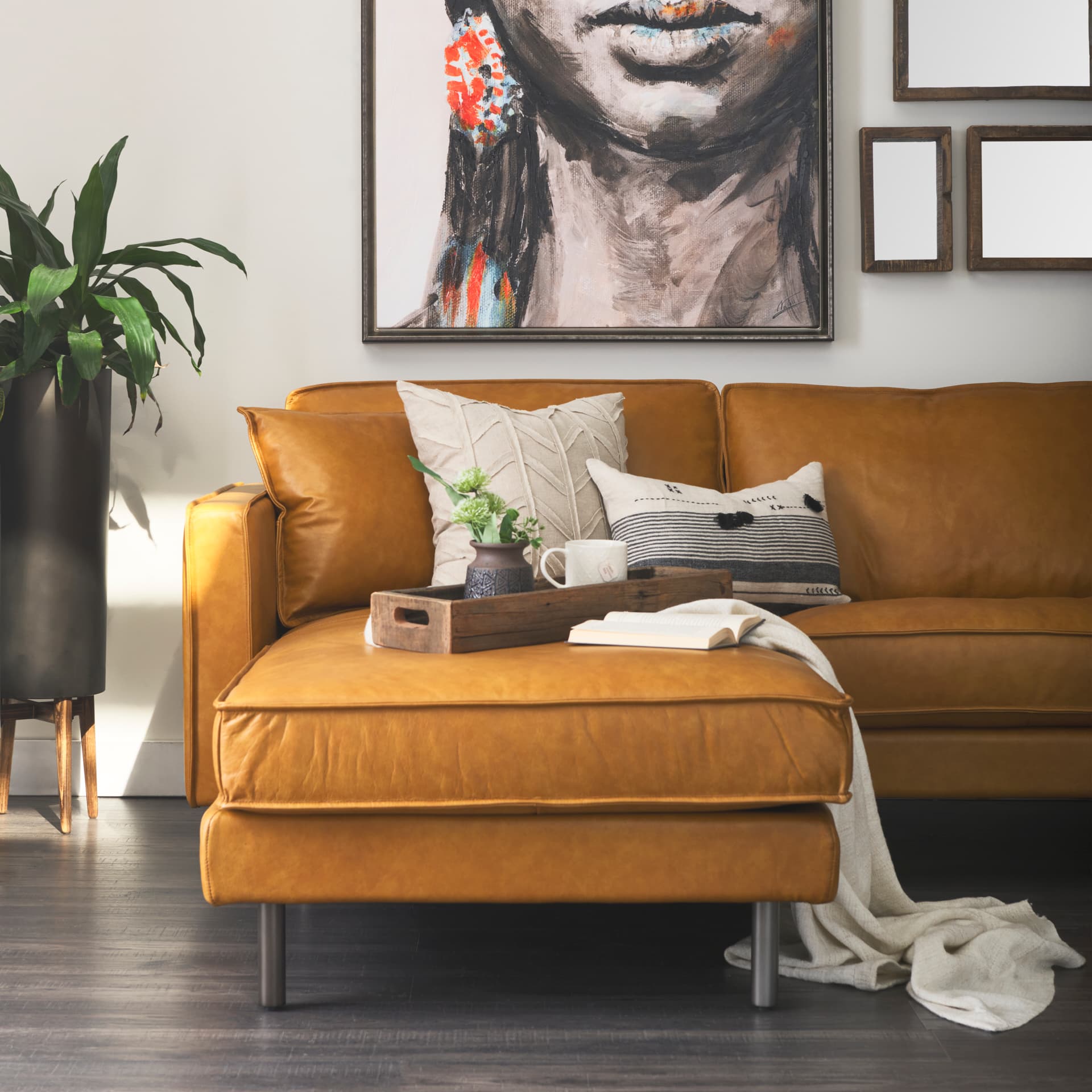 D'Arcy 111"L x 70"D x 33"H Tan Leather Left Chaise Sectional — product photograph